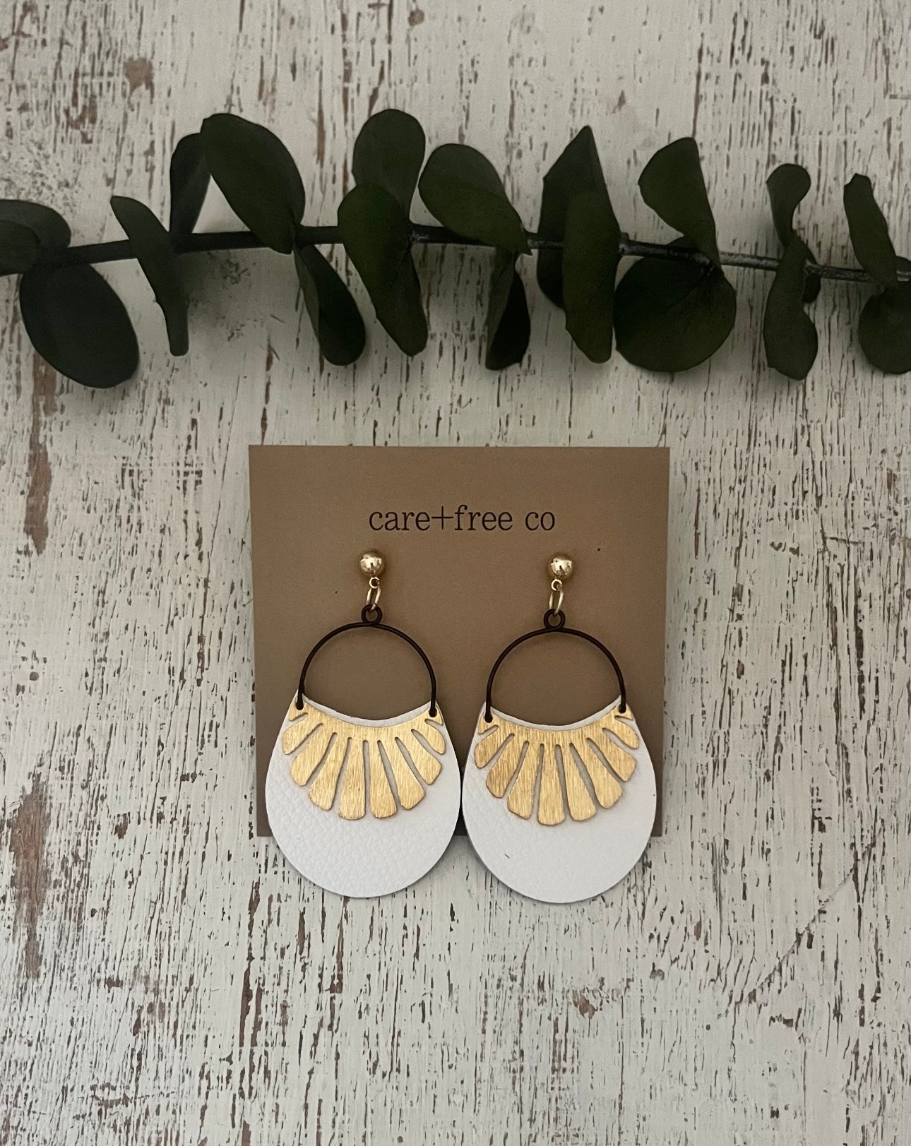 Leather Sun Ray Studs